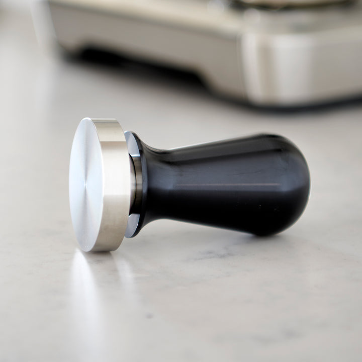 Flat Espresso Tamper on its side #size_53mm-flat